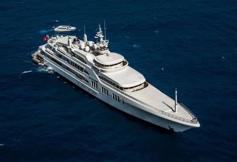 a white ship in the water aboard ECSTASEA Yacht for Sale