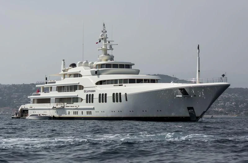 a large ship in the water aboard ECSTASEA Yacht for Sale