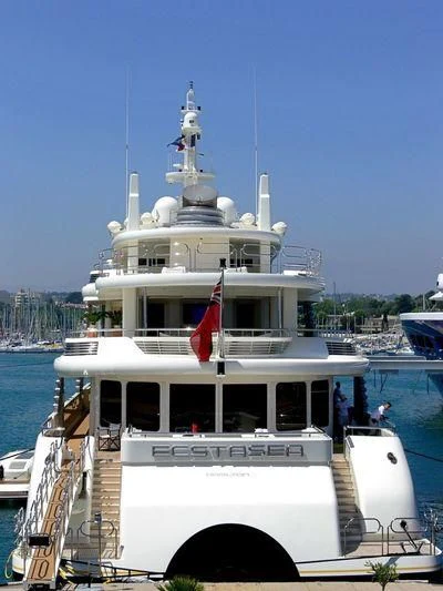 a large white boat aboard ECSTASEA Yacht for Sale