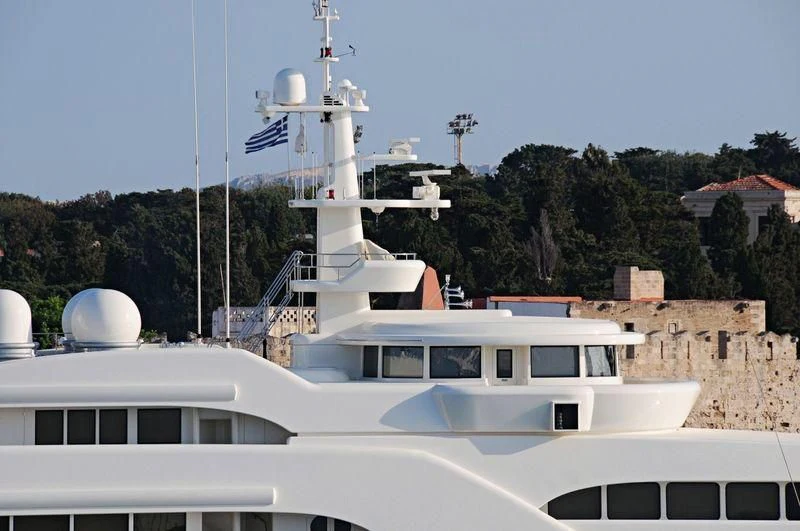 a white boat with a white tower aboard ECSTASEA Yacht for Sale