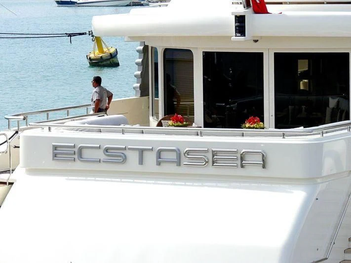 a person sitting on a boat aboard ECSTASEA Yacht for Sale
