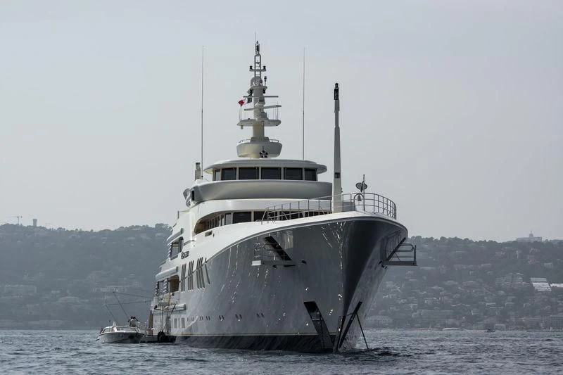 a large ship in the water aboard ECSTASEA Yacht for Sale