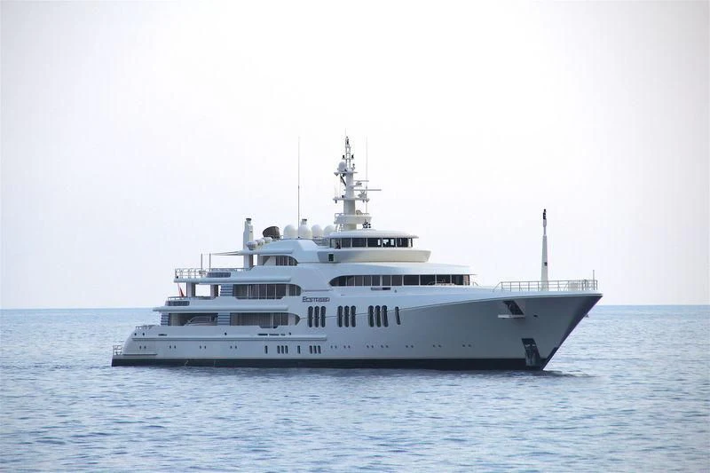 a large white boat in the water aboard ECSTASEA Yacht for Sale