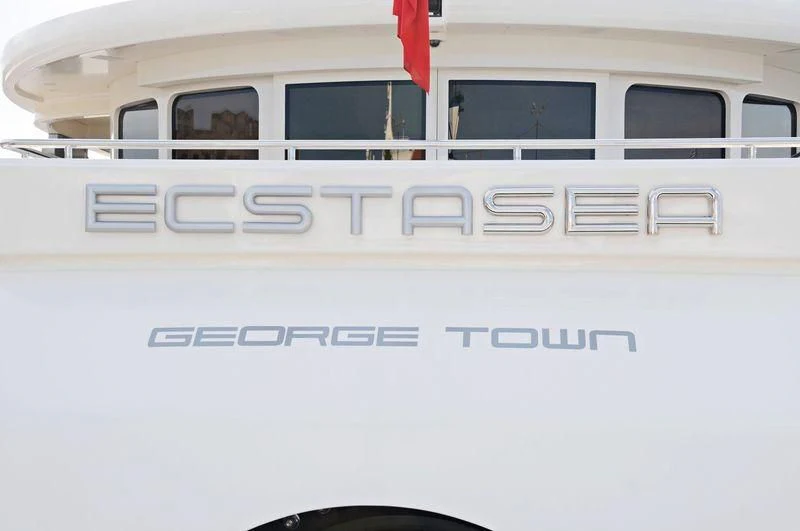 the front of a white car aboard ECSTASEA Yacht for Sale