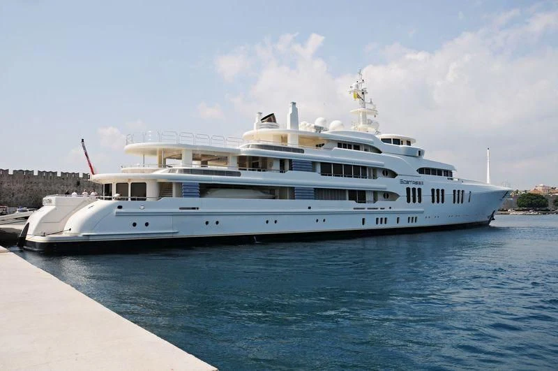 a large white boat on the water aboard ECSTASEA Yacht for Sale