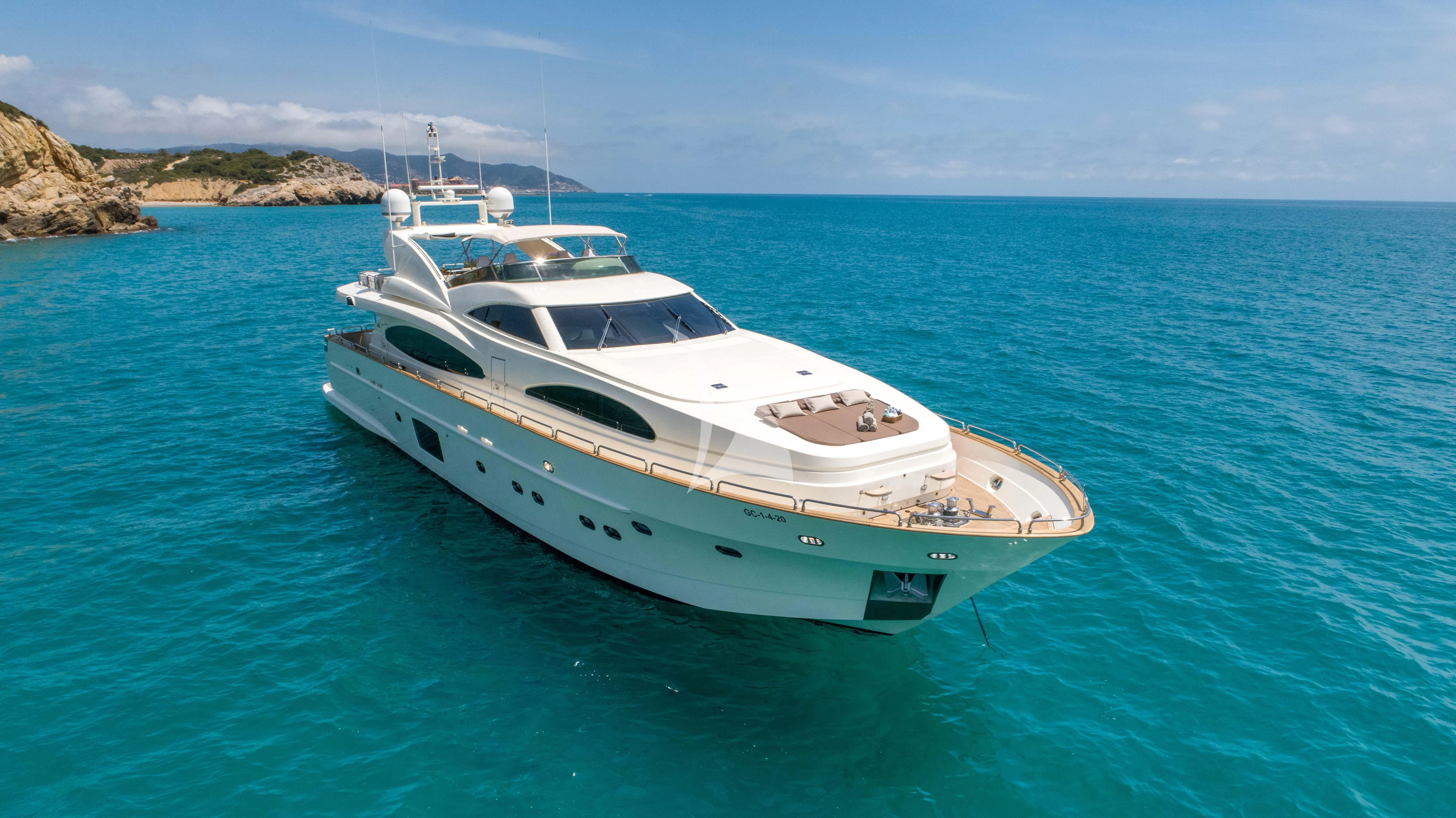 a white yacht in the water aboard DOLCE VITA IV Yacht for Sale