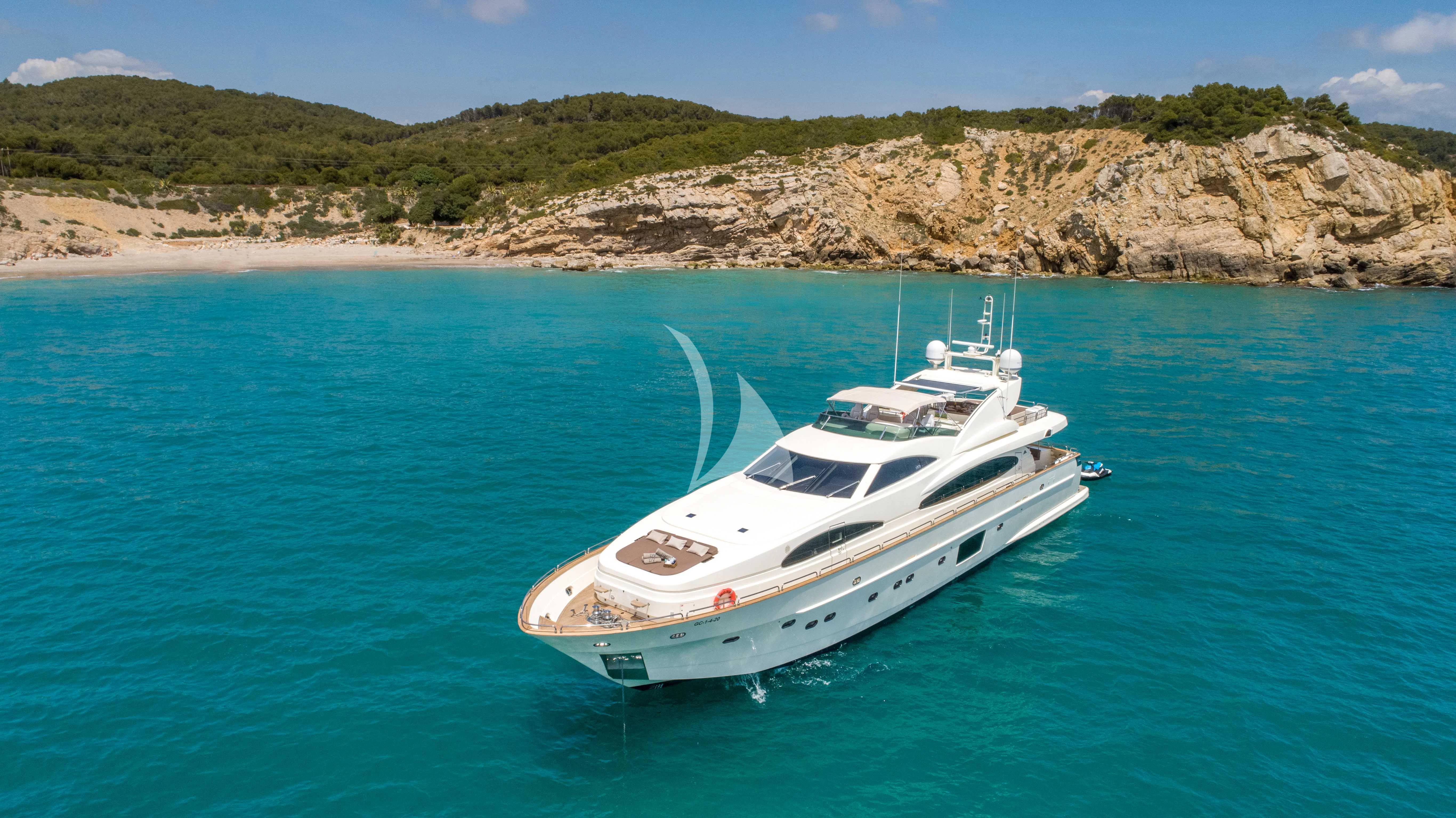 a white boat in the water aboard DOLCE VITA IV Yacht for Sale