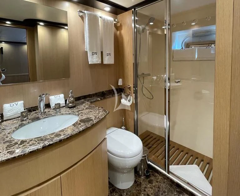 a bathroom with a sink and toilet aboard DOLCE VITA IV Yacht for Sale