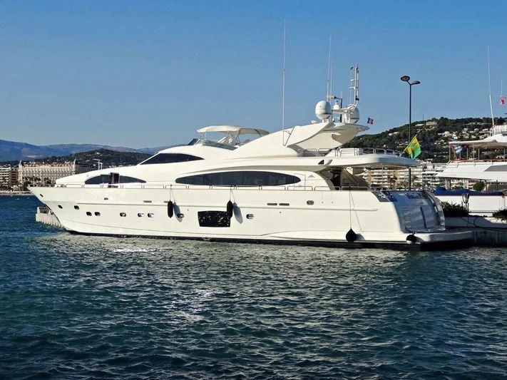 a white yacht in the water aboard DOLCE VITA IV Yacht for Sale