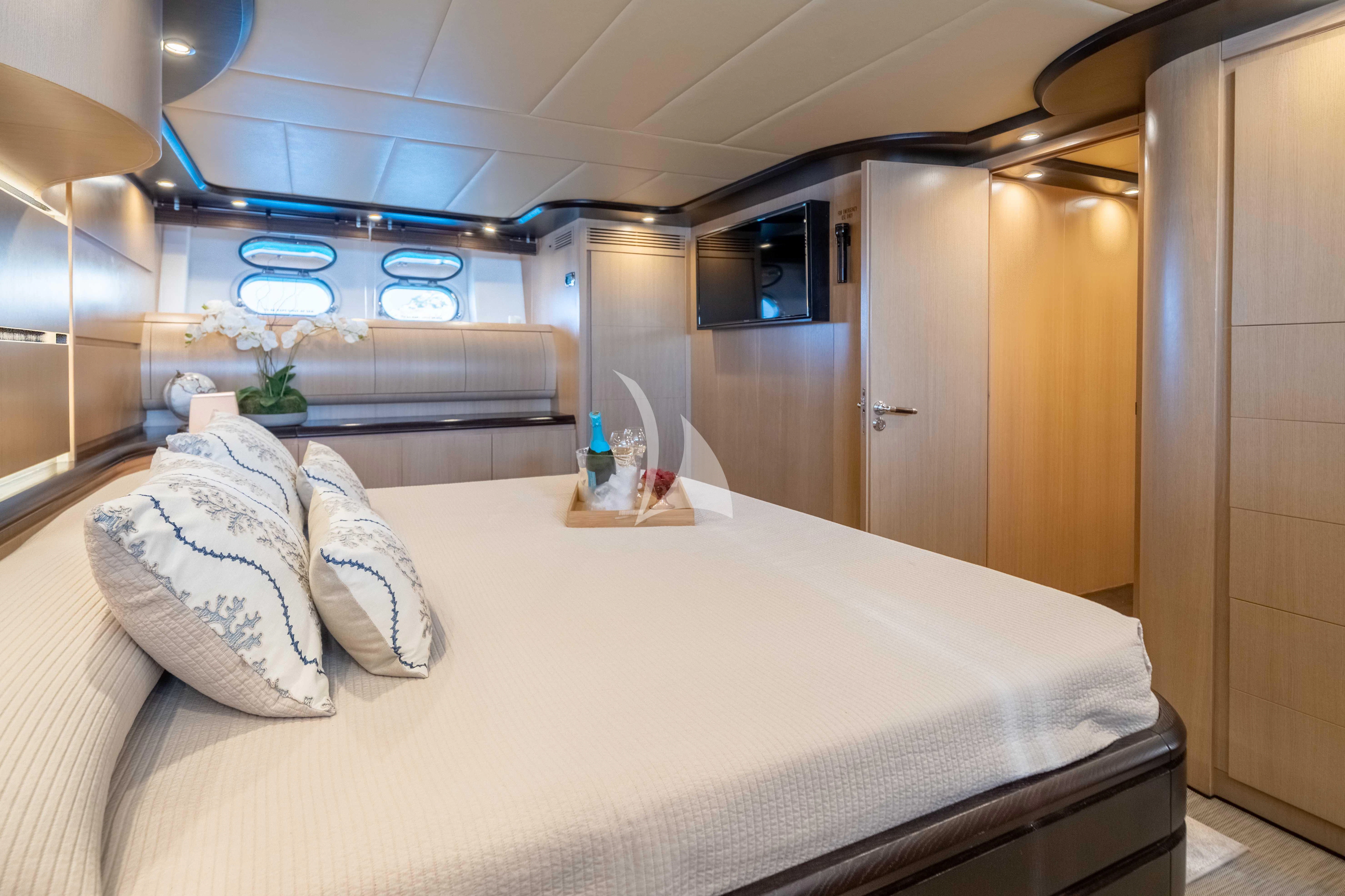 a bed in a room aboard DOLCE VITA IV Yacht for Sale