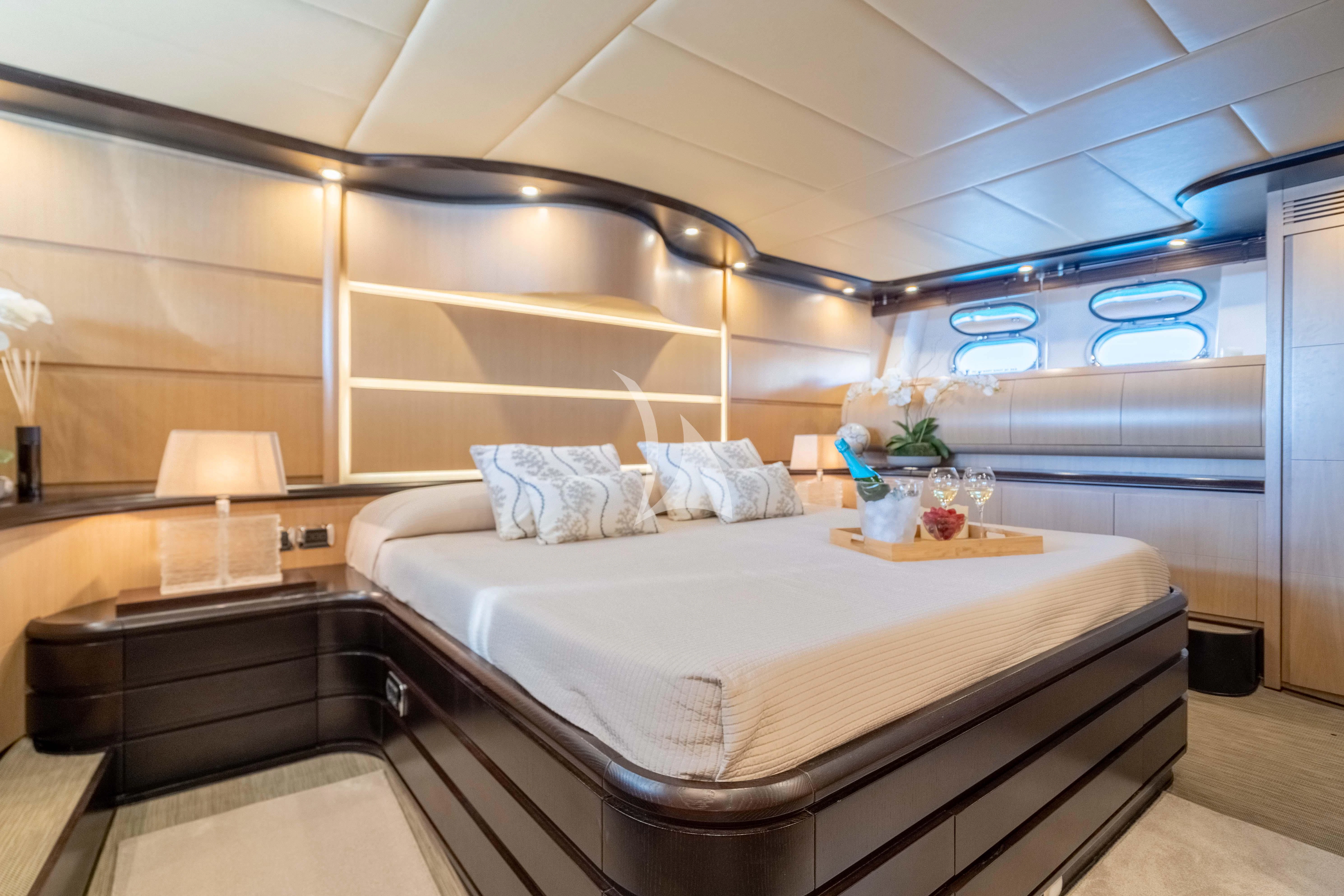 a bed in a room aboard DOLCE VITA IV Yacht for Sale