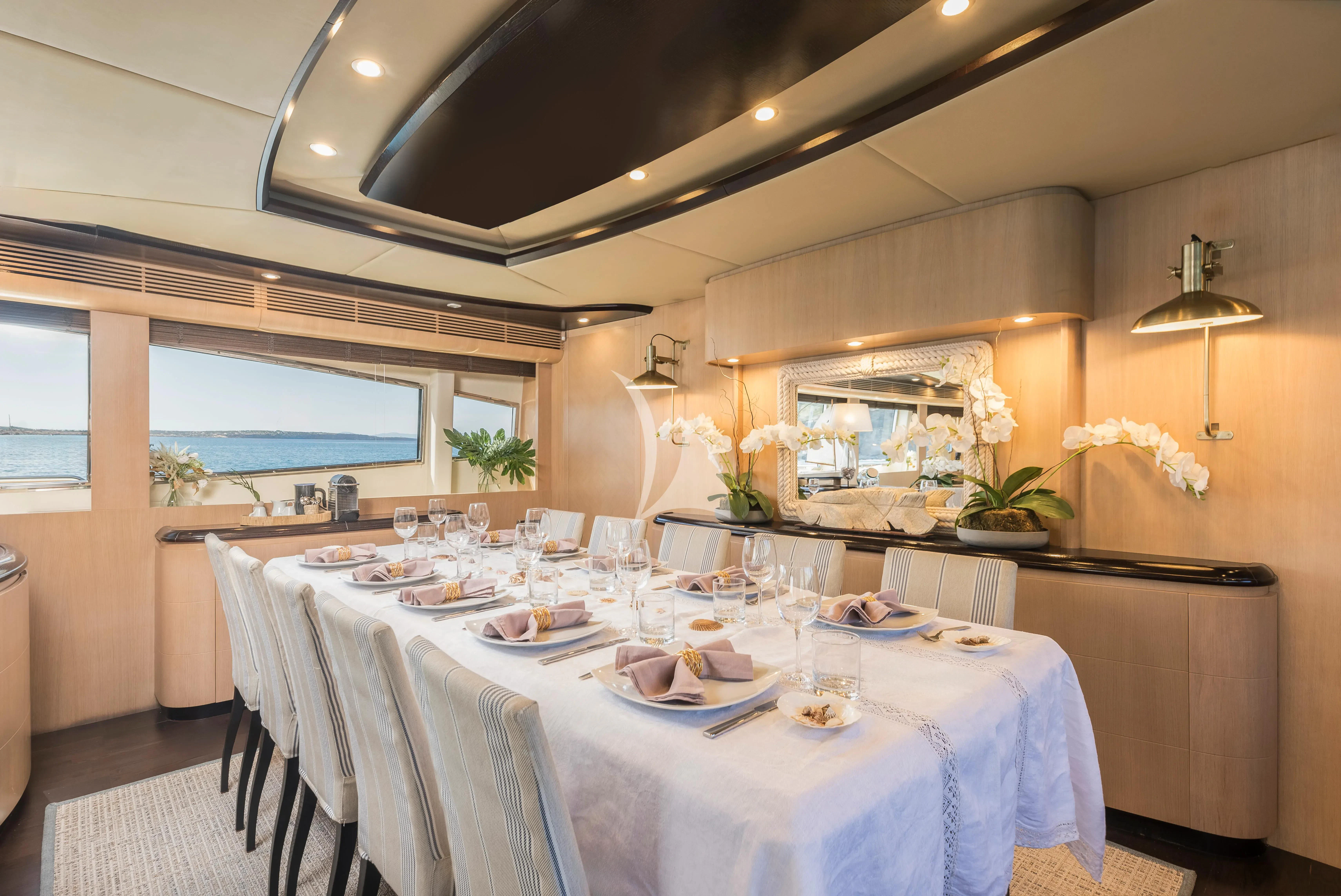 a table set for a dinner aboard DOLCE VITA IV Yacht for Sale