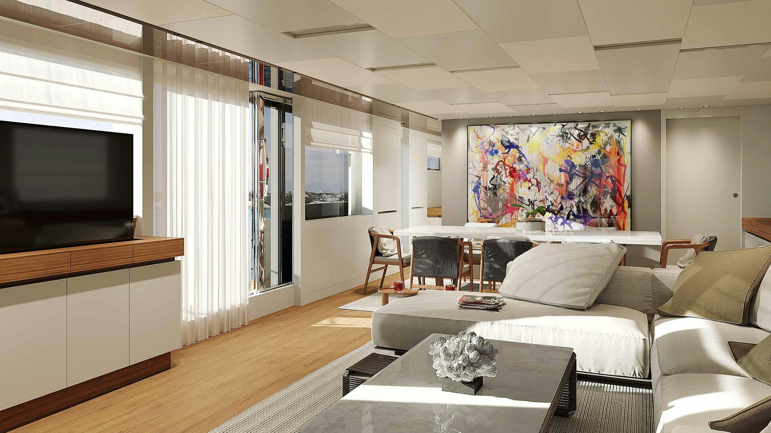 a living room with a large screen aboard SALT Yacht for Charter