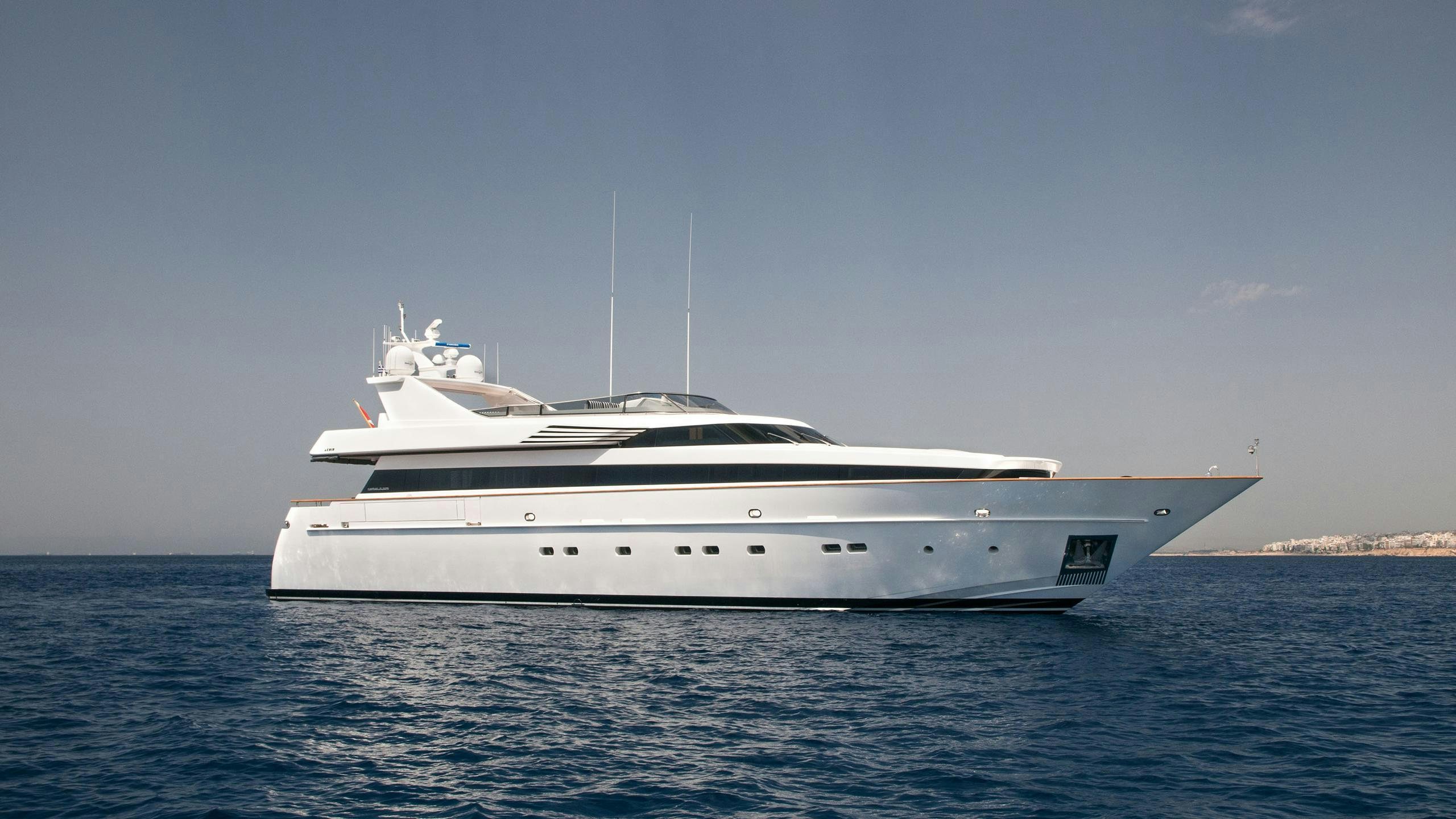 a white yacht in the water aboard REGINA K Yacht for Charter