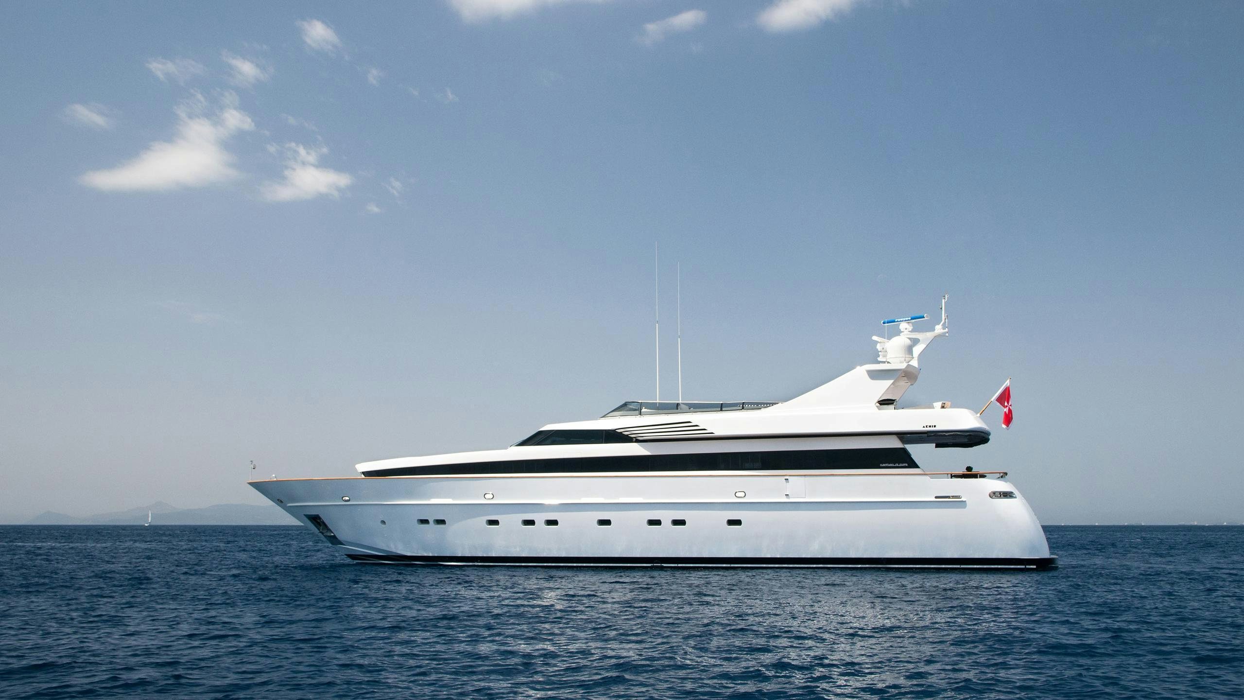 a white yacht in the water aboard REGINA K Yacht for Charter