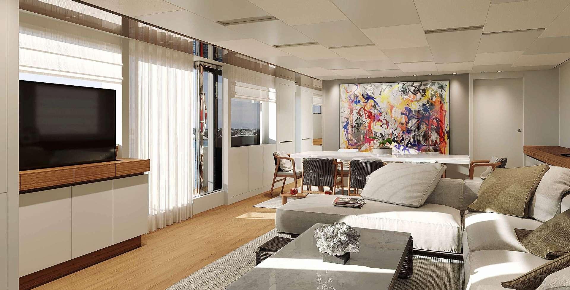 a living room with a large screen aboard SALT Yacht for Charter