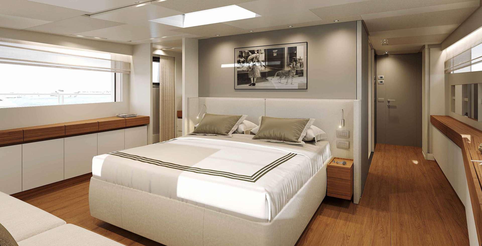 a large bedroom with a large bed aboard SALT Yacht for Charter