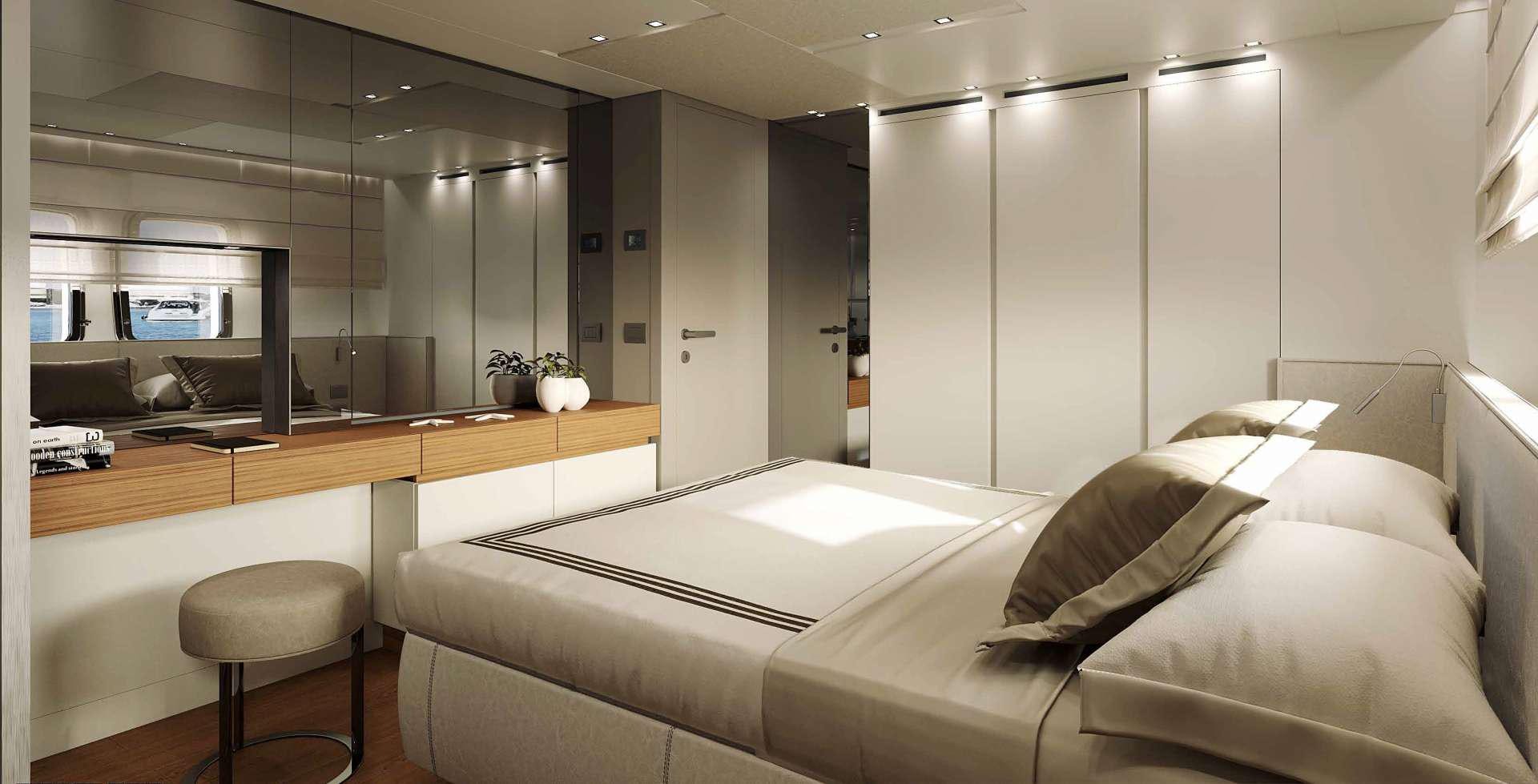 a room with a bed and a desk aboard SALT Yacht for Charter