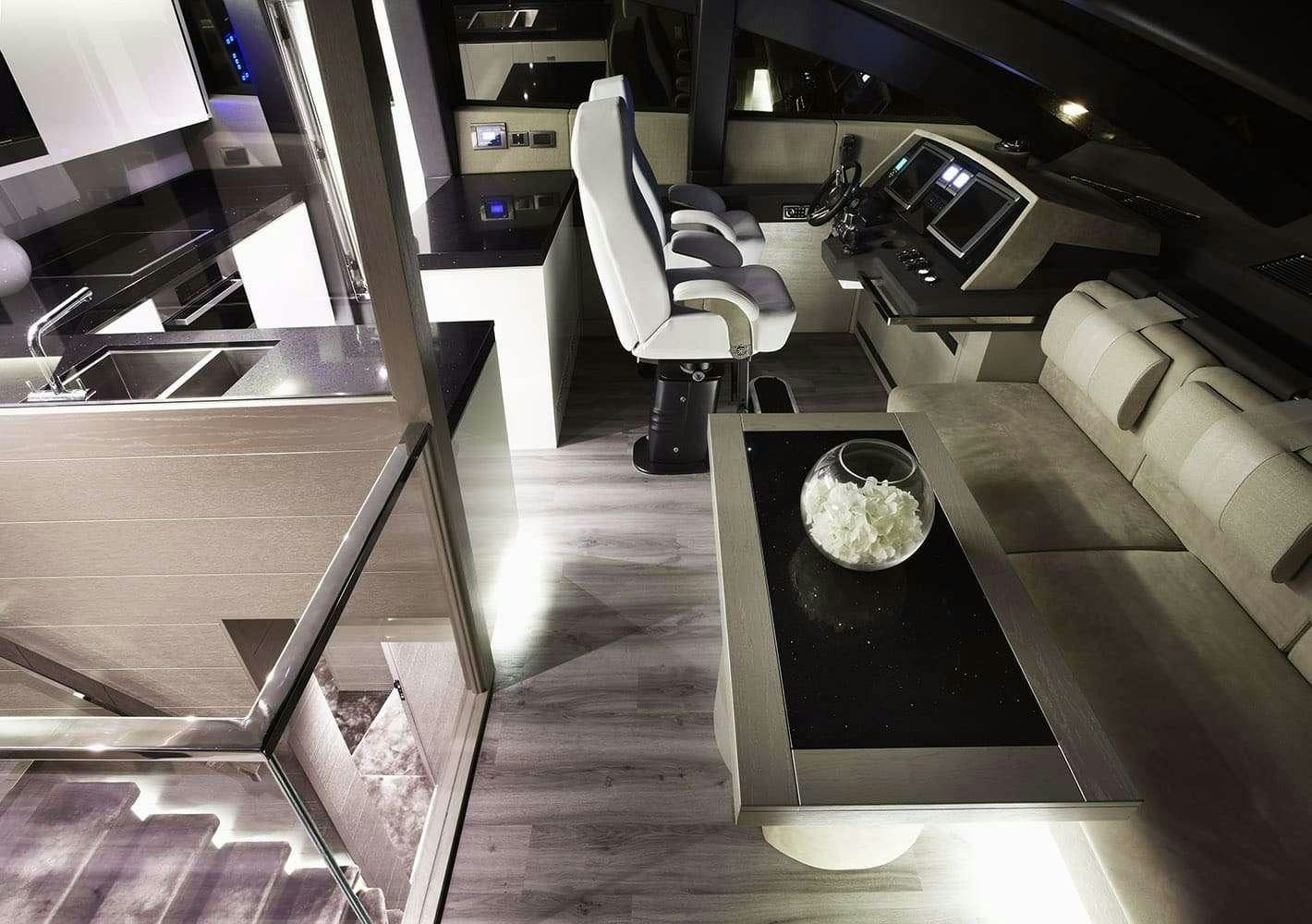 a room with a couch and a table aboard FINALLY Yacht for Charter