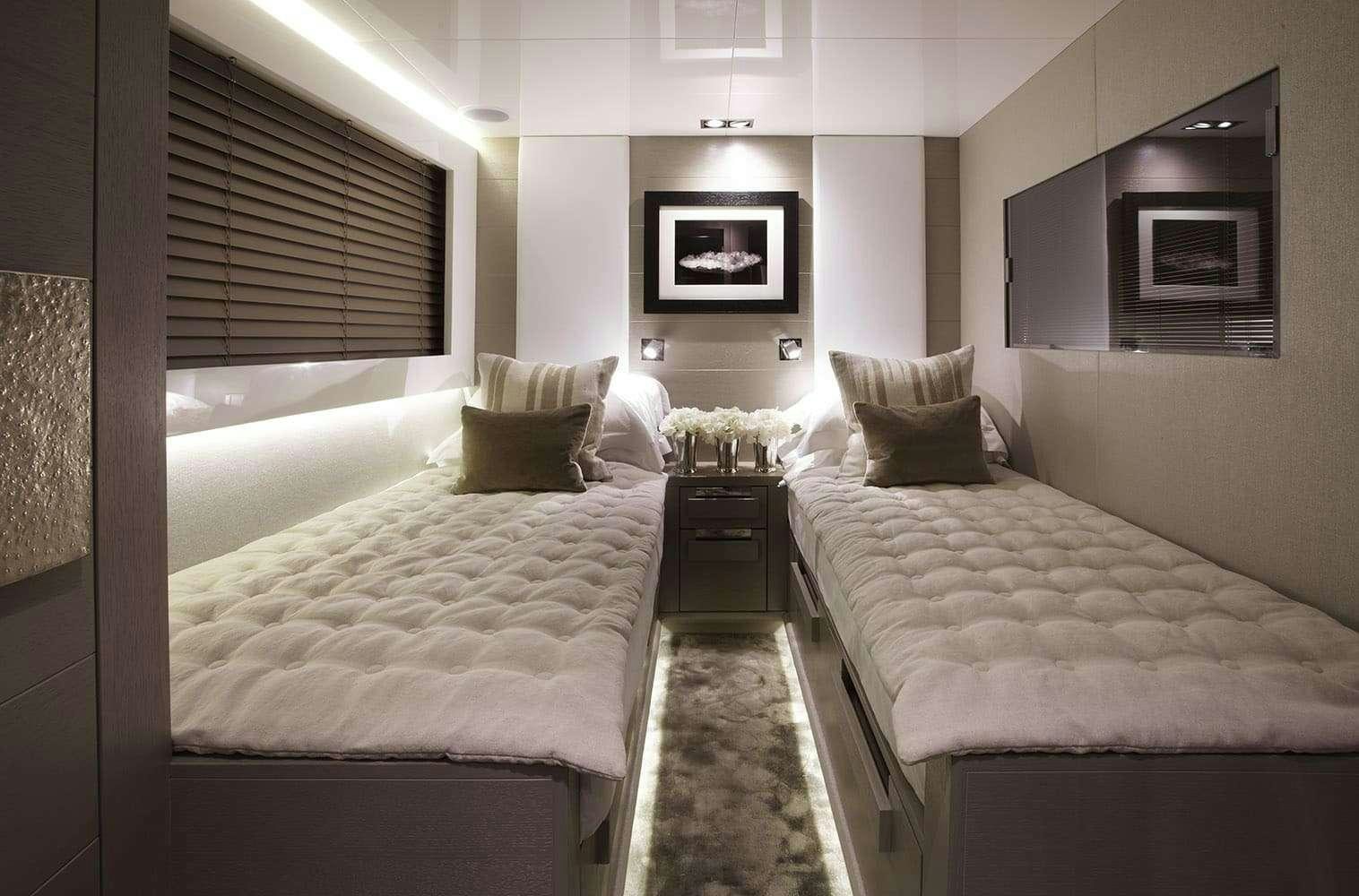 a room with two beds aboard FINALLY Yacht for Charter