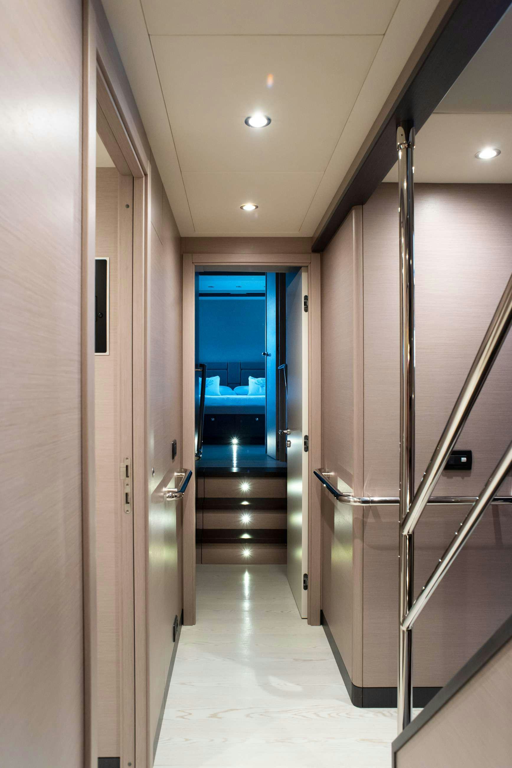 a hallway with doors aboard GRANIL Yacht for Sale