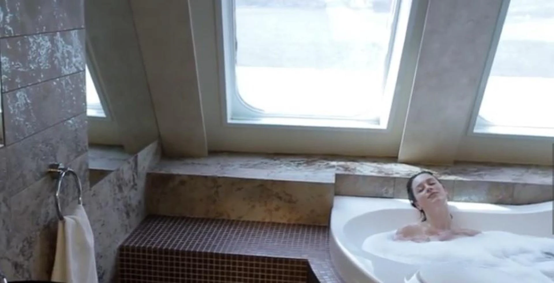 a person in a bathtub aboard AEGEAN PARADISE Yacht for Sale