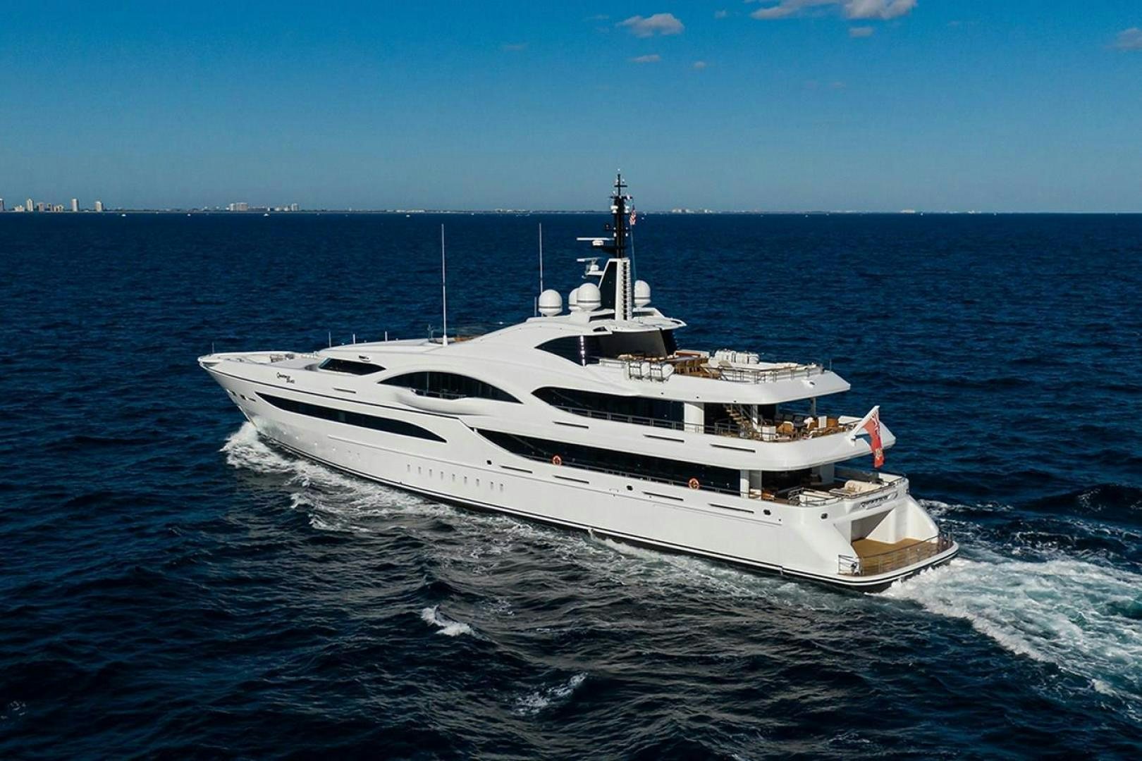 a white yacht on the water aboard QUANTUM OF SOLACE Yacht for Sale