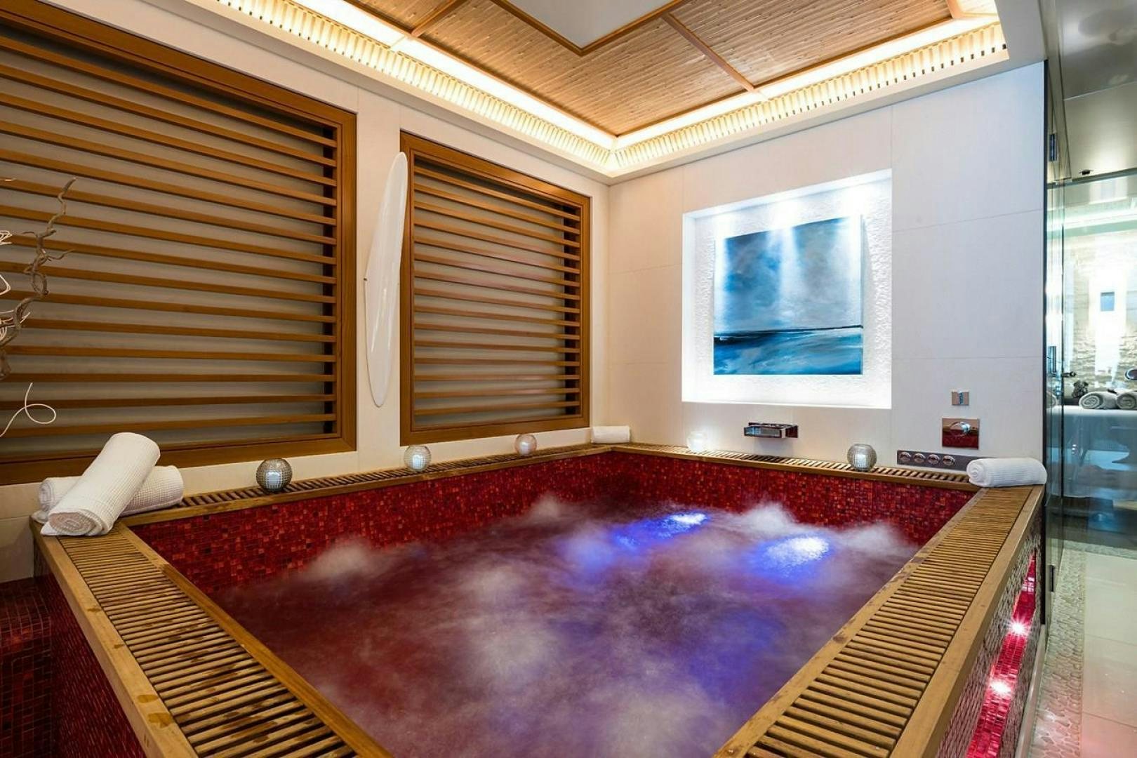 a large indoor pool aboard QUANTUM OF SOLACE Yacht for Sale