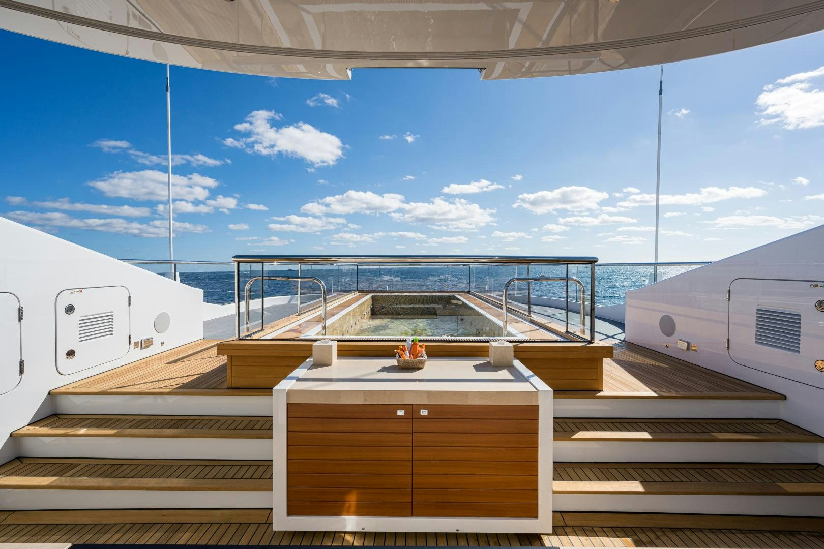 a deck of a boat aboard QUANTUM OF SOLACE Yacht for Sale