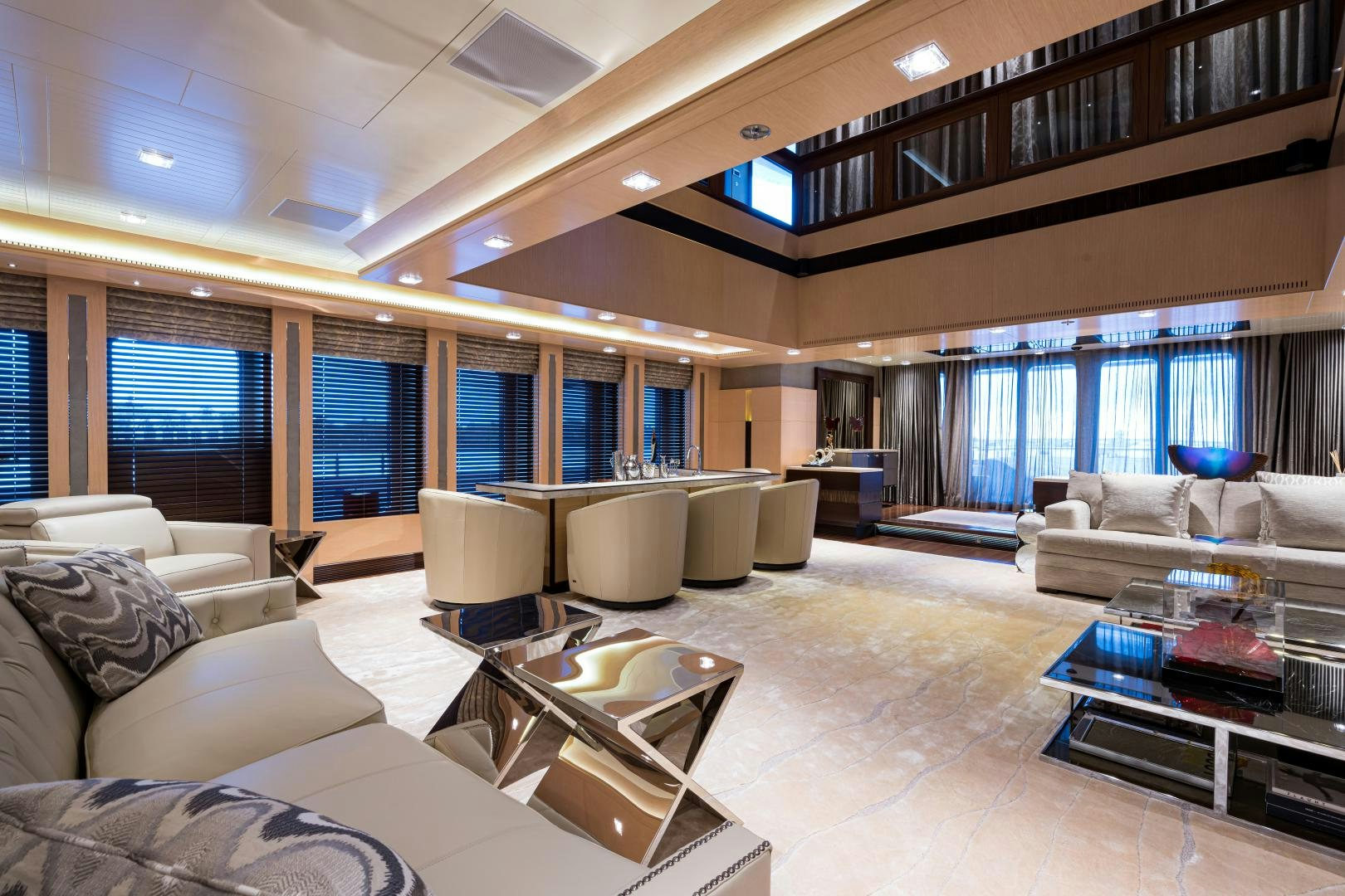 a living room with a large window aboard QUANTUM OF SOLACE Yacht for Sale