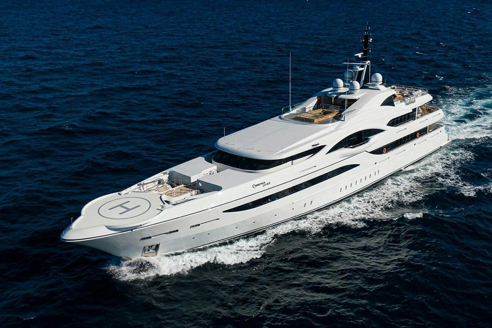a white yacht in the water aboard QUANTUM OF SOLACE Yacht for Sale