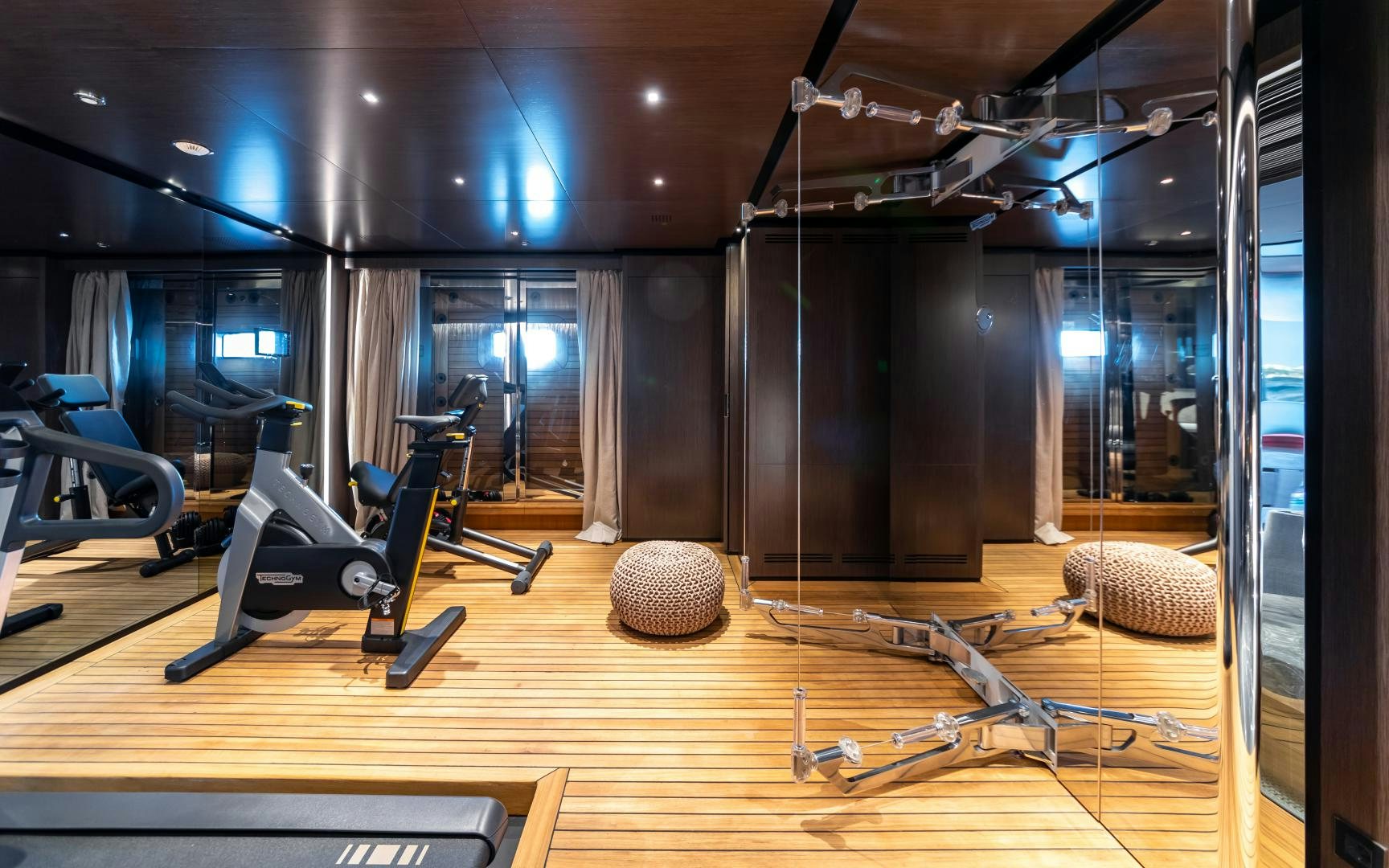 a gym with exercise equipment aboard SOLO Yacht for Sale