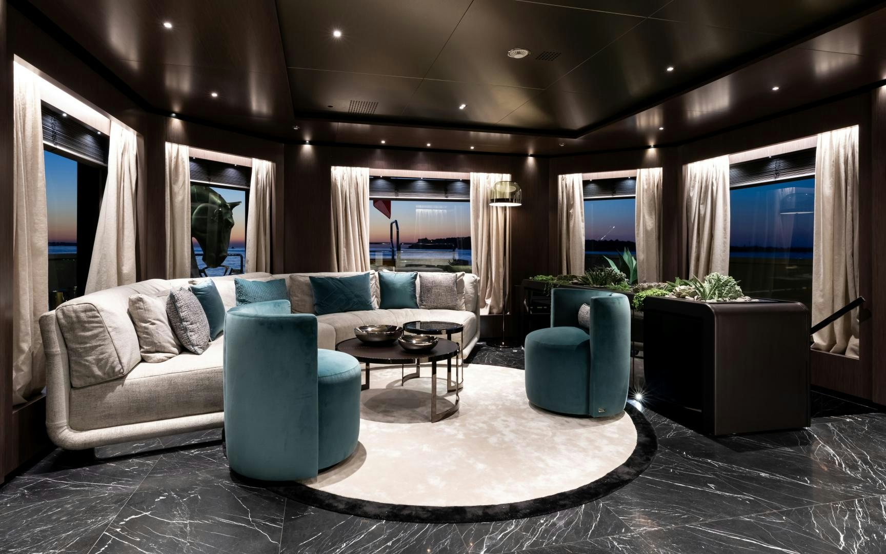 a living room with a large window aboard SOLO Yacht for Sale