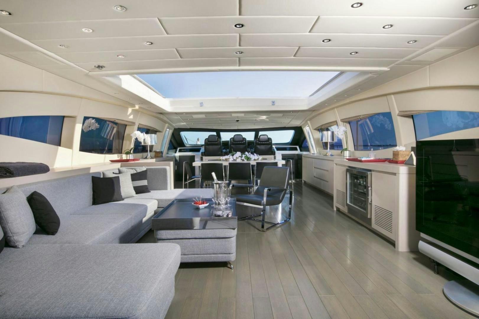 a room with a table and chairs aboard MOSKING Yacht for Sale