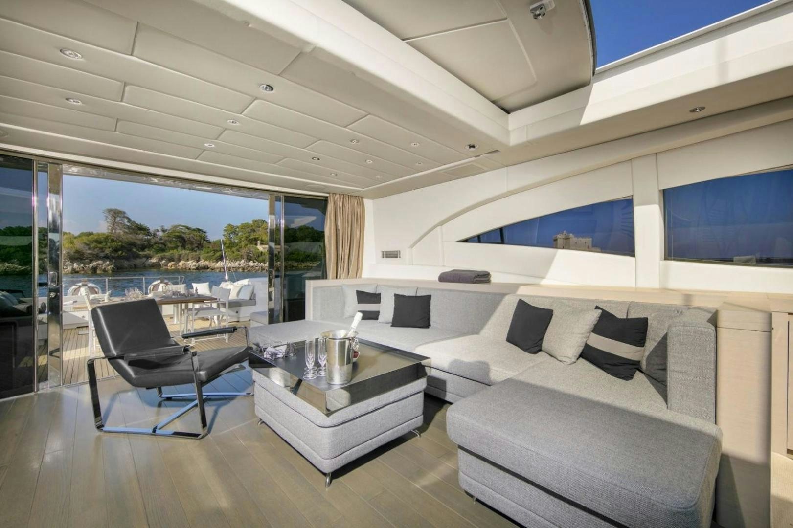 a living room with a large window aboard MOSKING Yacht for Sale