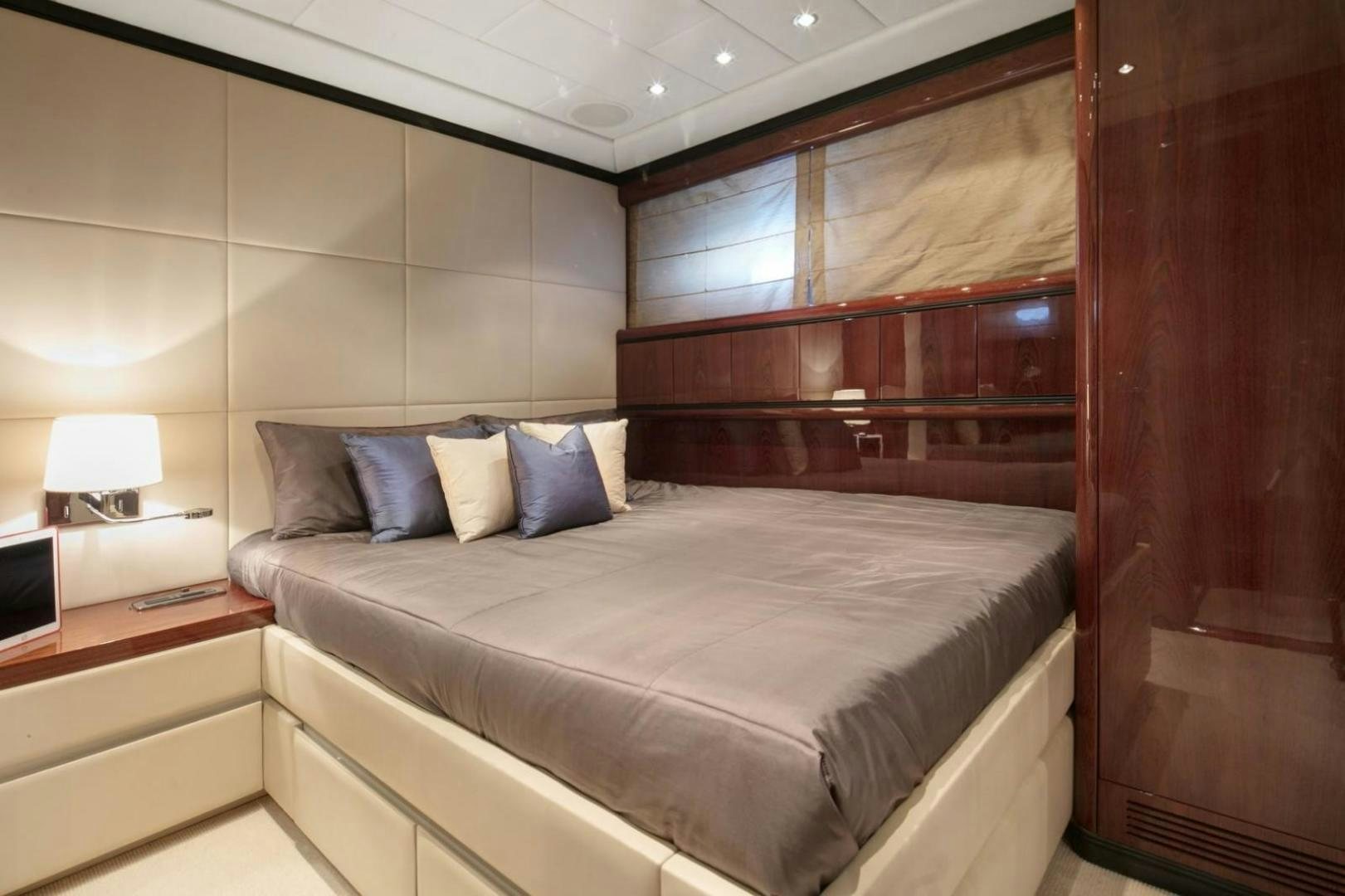 a bed in a room aboard MOSKING Yacht for Sale