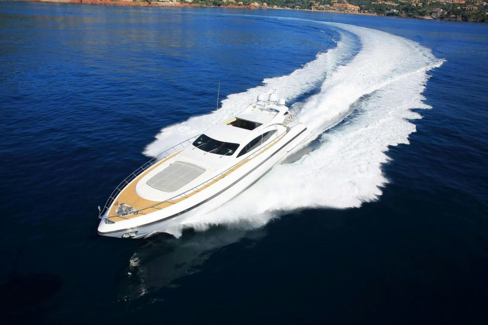 a white boat on water aboard MOSKING Yacht for Sale