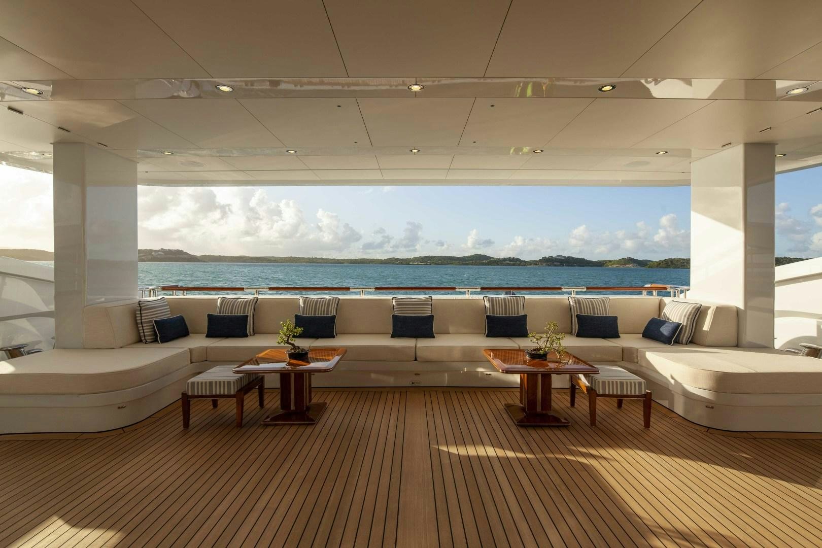 a living room with a large window aboard ROCK.IT Yacht for Charter