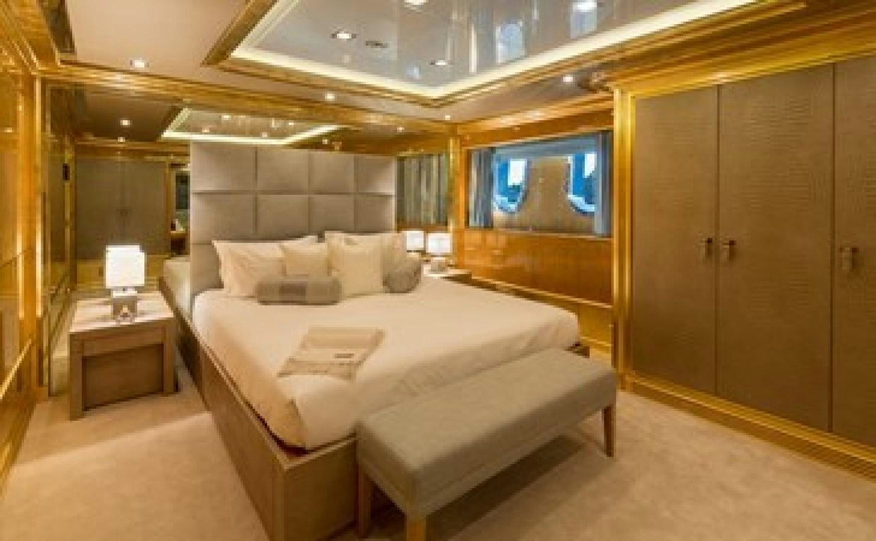 a hotel room with a bed aboard ANDIAMO Yacht for Sale