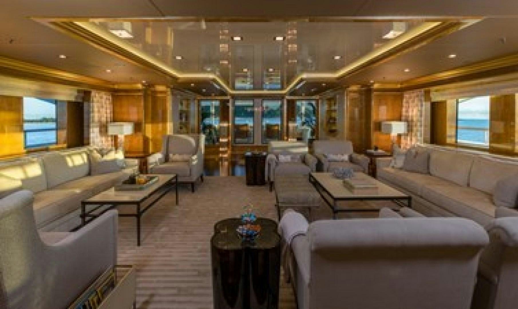 a living room with a large window aboard ANDIAMO Yacht for Sale