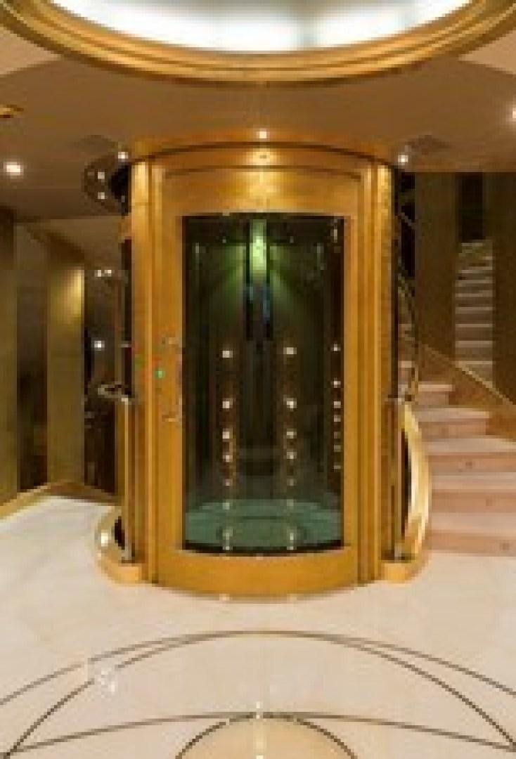 a large glass door aboard ANDIAMO Yacht for Sale