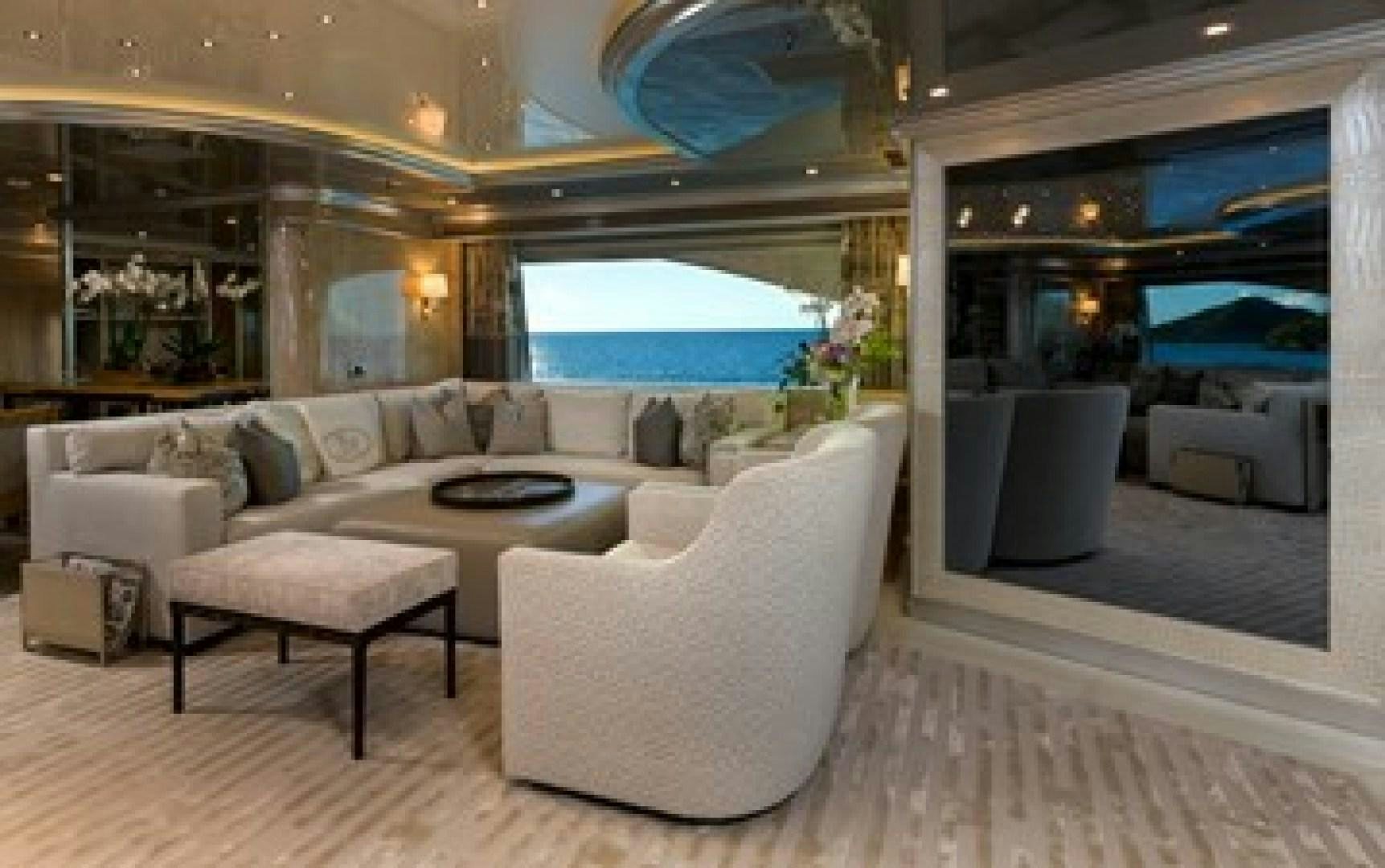 a living room with a large window aboard ANDIAMO Yacht for Sale