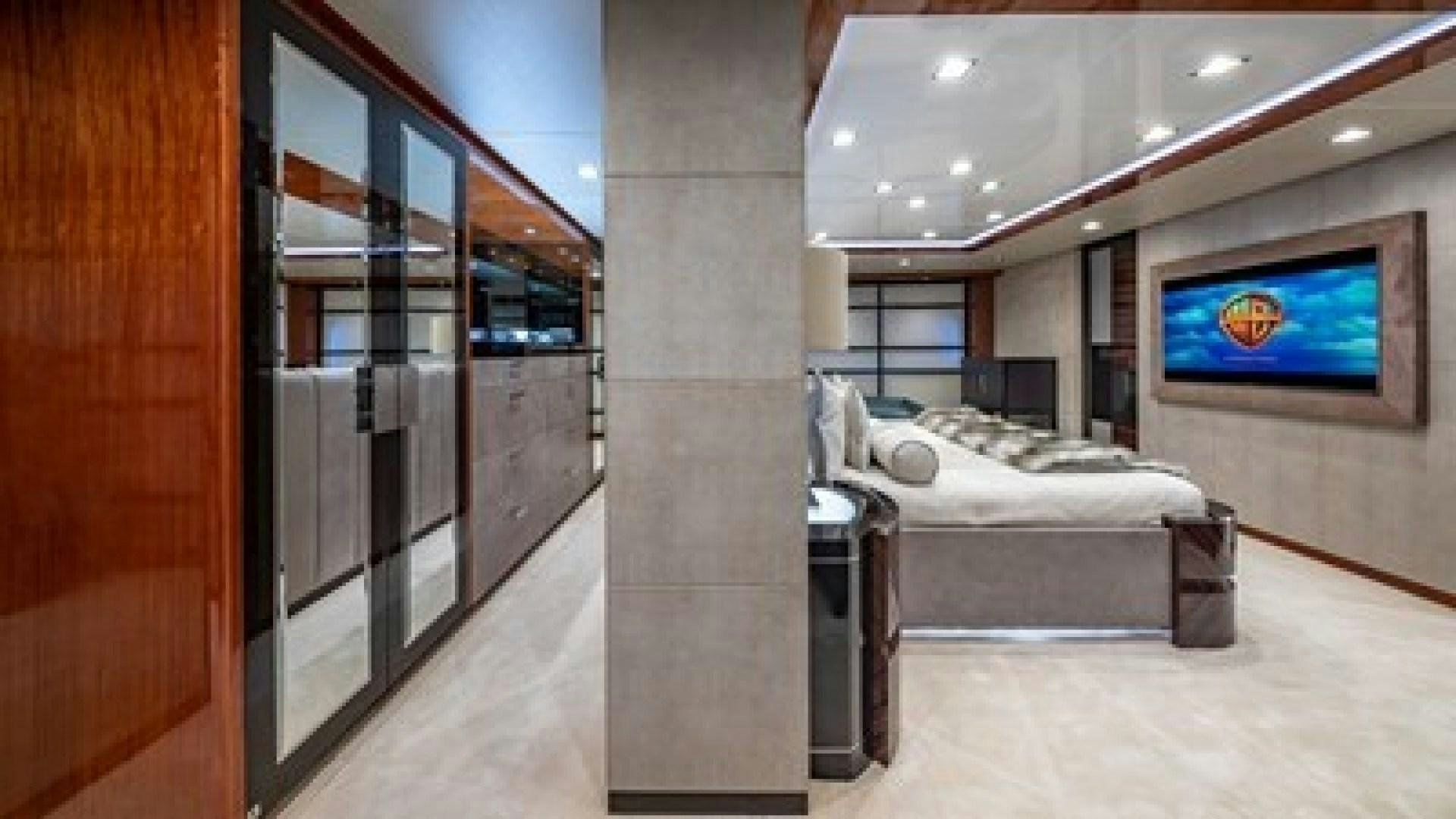 a room with a bed and a television aboard HOLDIN' MY OWN Yacht for Sale