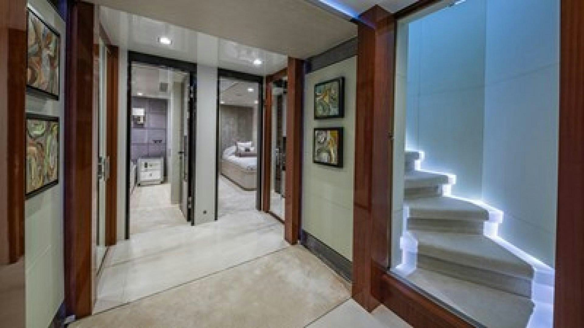 a hallway with a glass door aboard HOLDIN' MY OWN Yacht for Sale