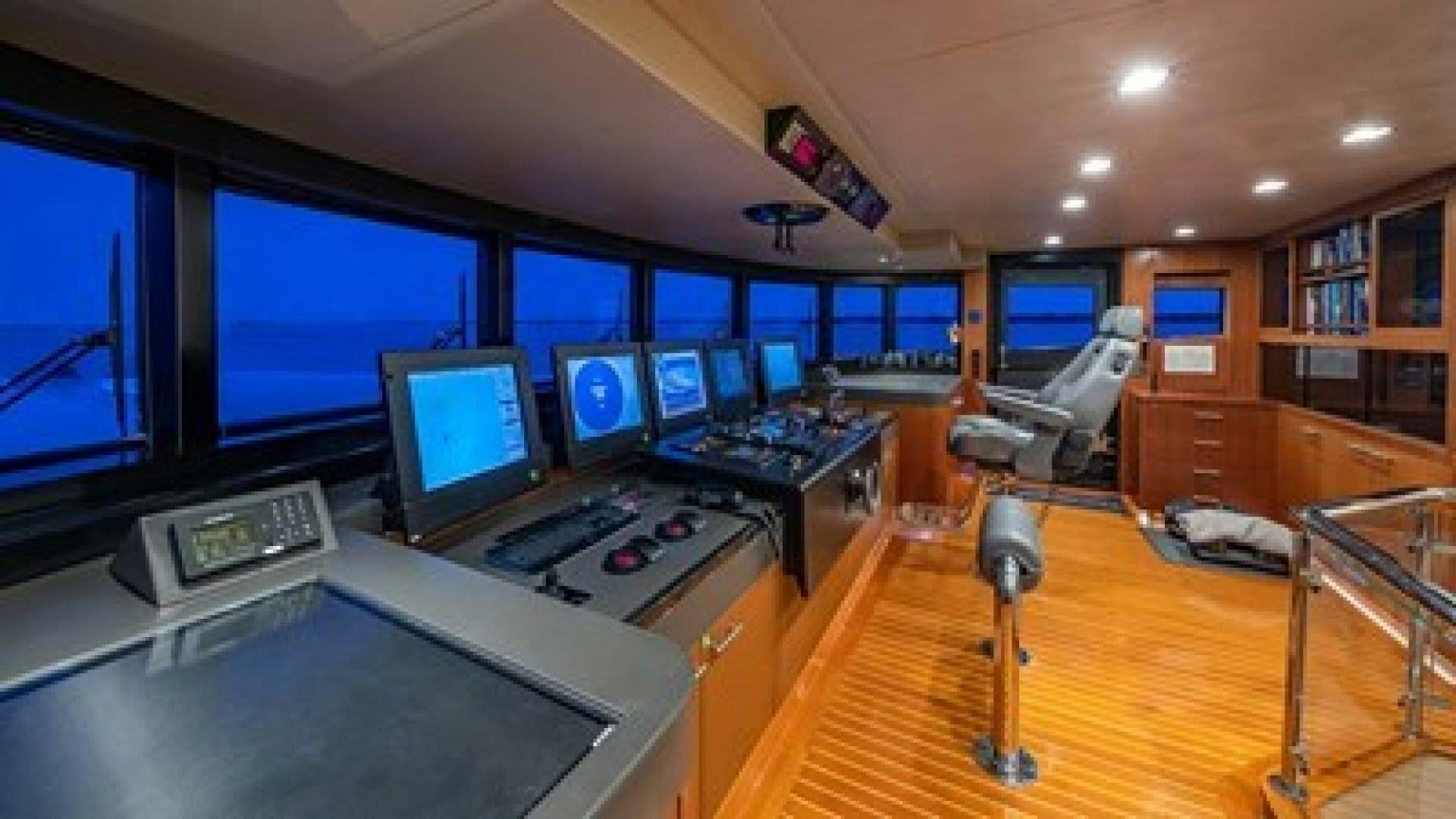 a room with many computer screens aboard HOLDIN' MY OWN Yacht for Sale