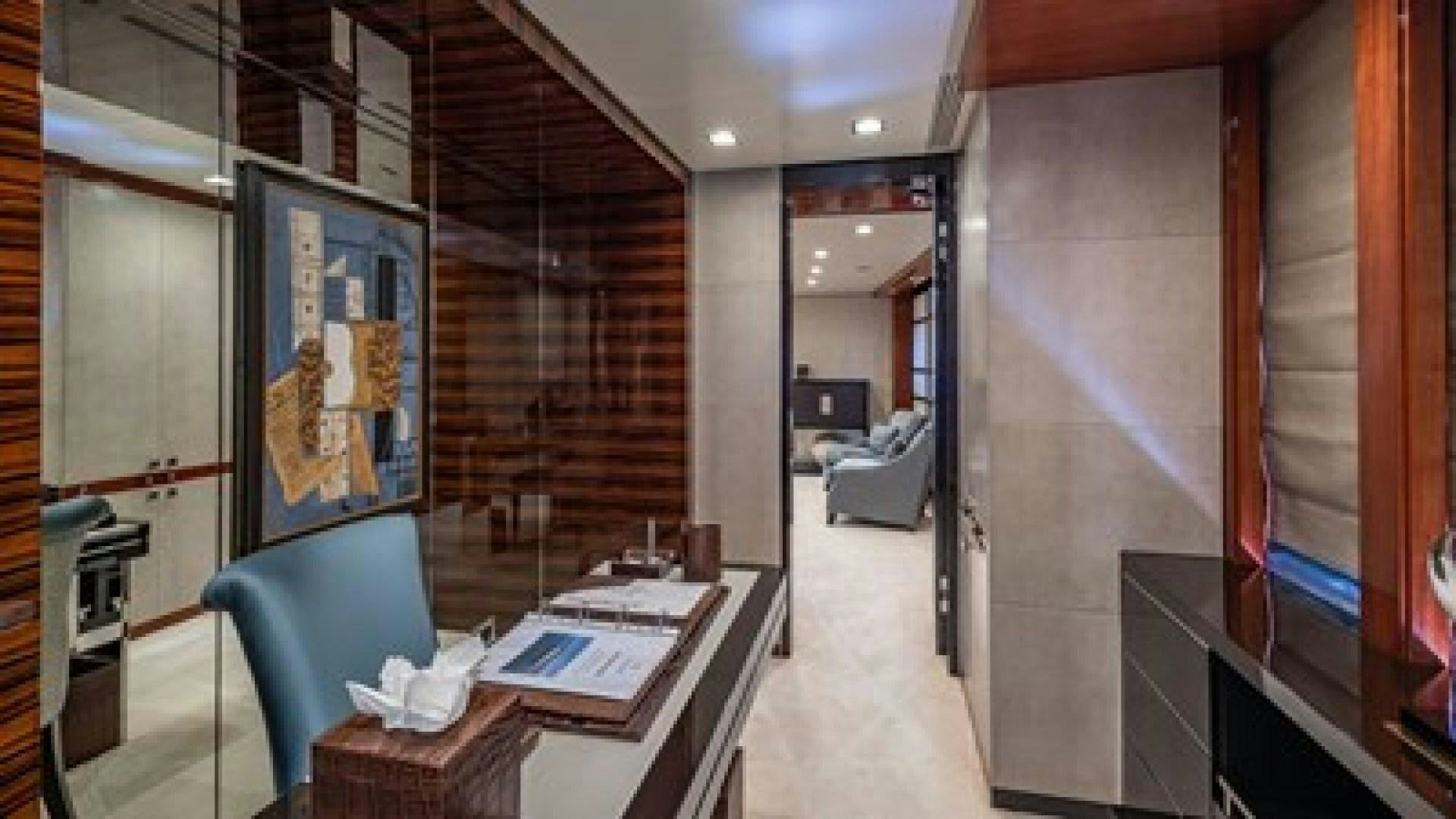 a room with a desk and a bed aboard HOLDIN' MY OWN Yacht for Sale