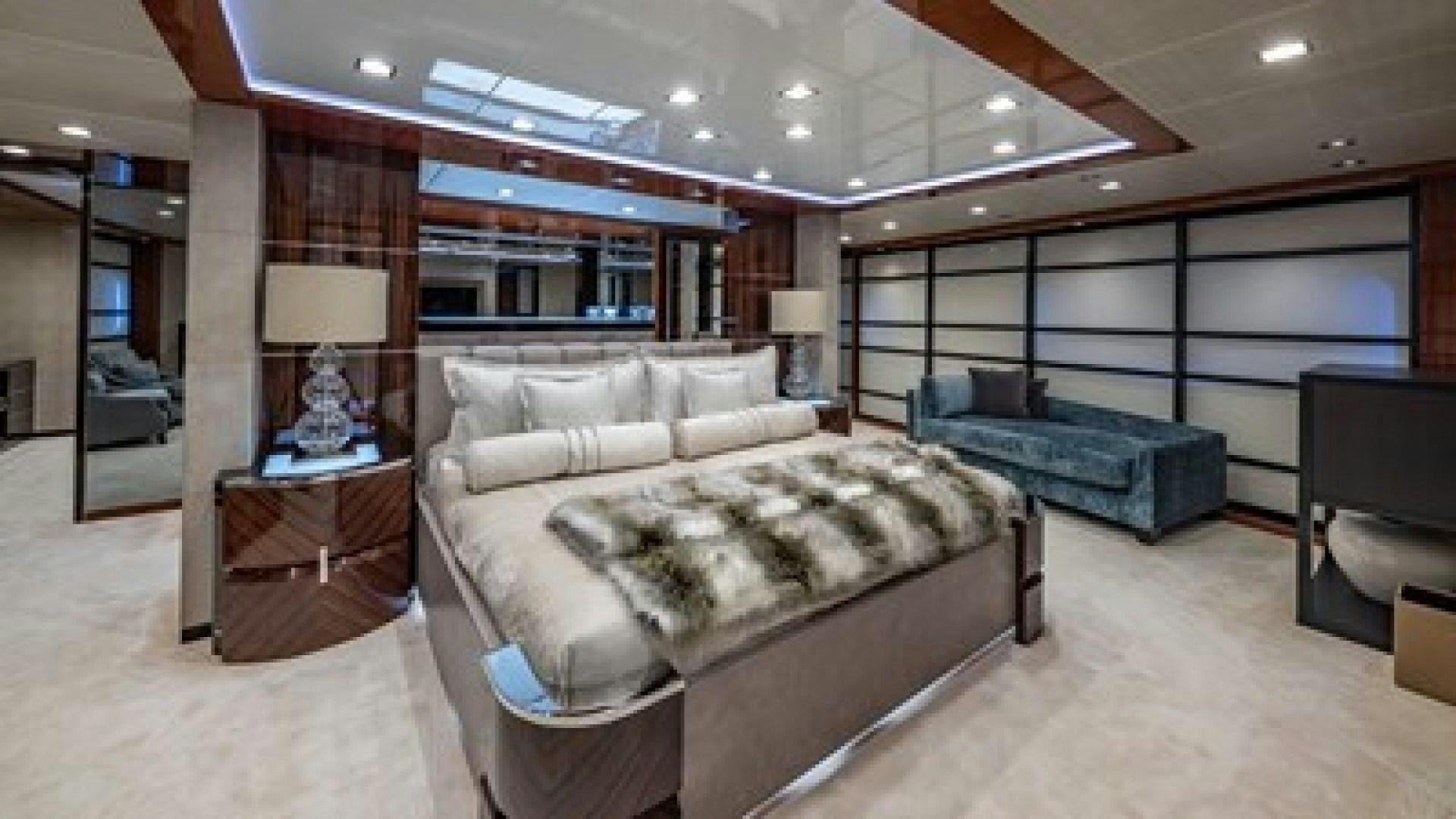 a large room with a couch and a table aboard HOLDIN' MY OWN Yacht for Sale