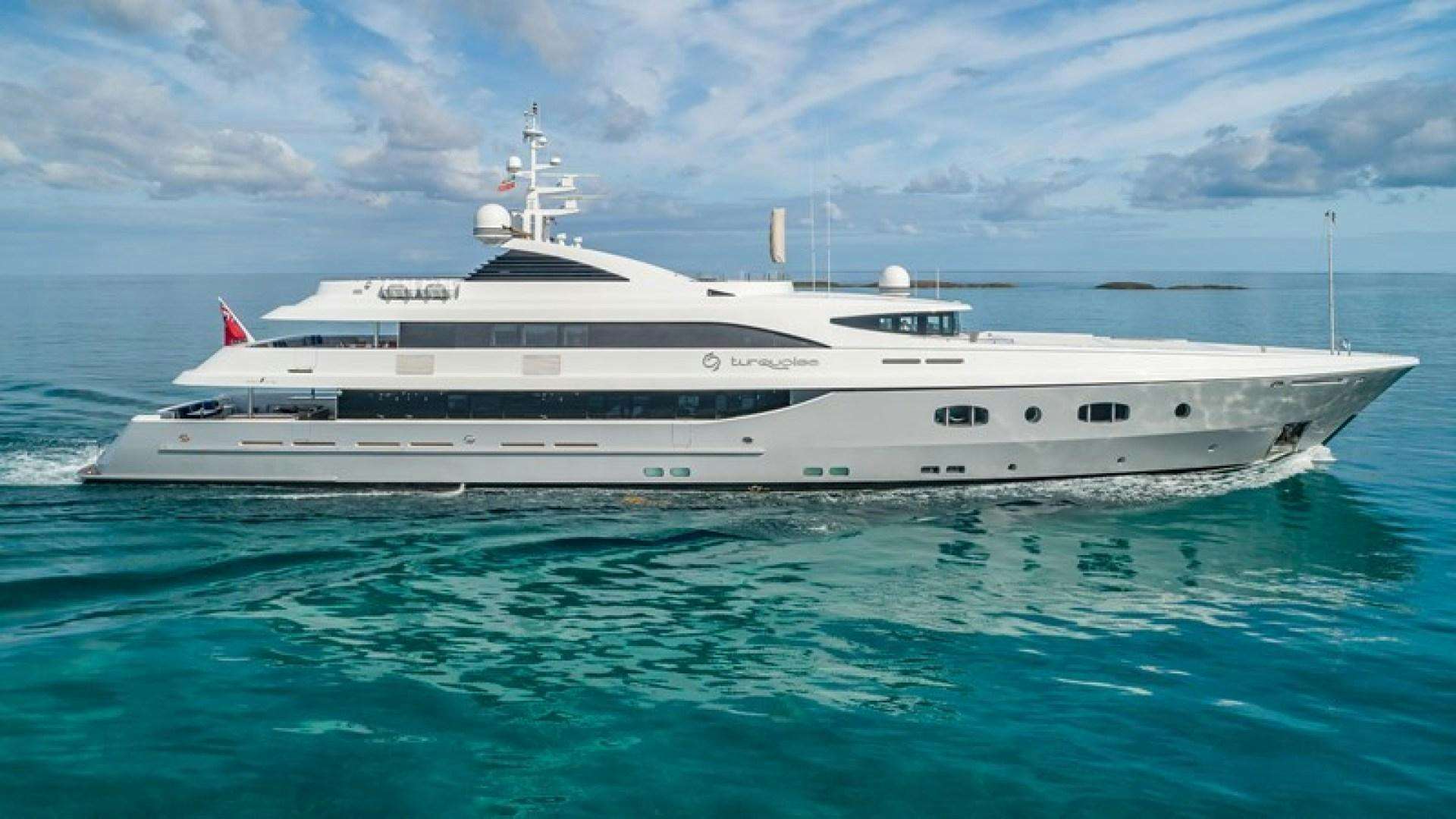 a large white ship in the water aboard TURQUOISE Yacht for Sale