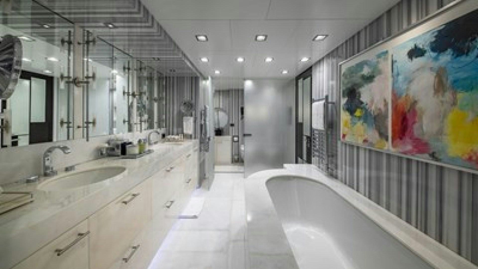 a bathroom with a large tub aboard HOLDIN' MY OWN Yacht for Sale