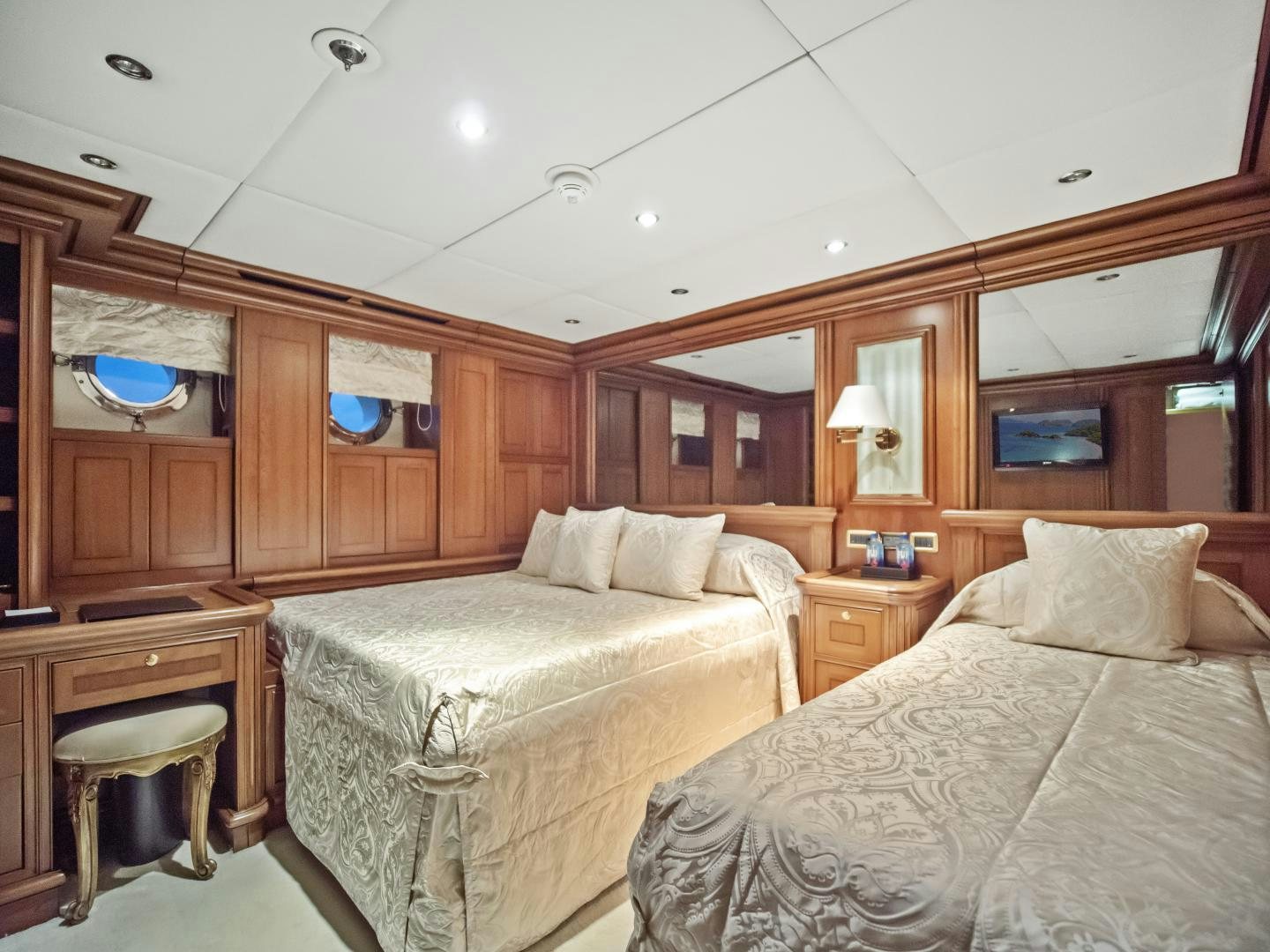 a room with two beds aboard THE LANGLEY Yacht for Sale